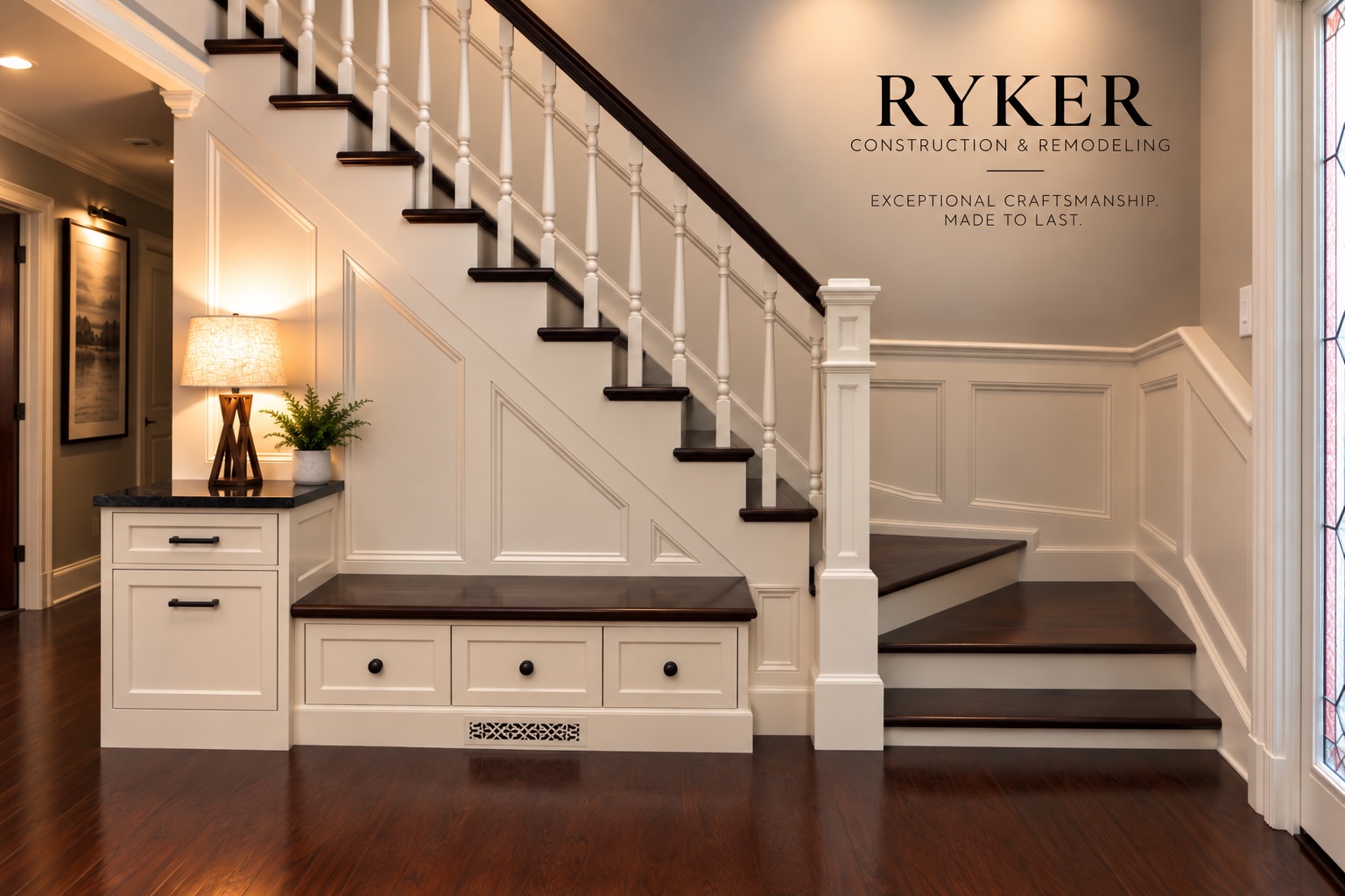 Finished interior staircase with dark wood treads, white balusters, paneled trim, and built-in storage